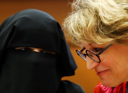 Agnes Callamard, U.N. special rapporteur listens to Yumna Desai during a side event called "Silencing Dissident" during the Human Rights Council at the United Nations in Geneva