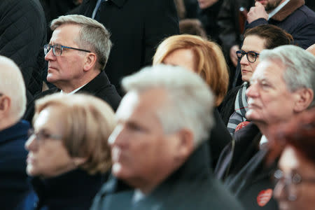 Former Polish President Bronislaw Komorowski (back-L) attends a funeral service for the city's mayor Pawel Adamowicz at St Mary's Basilica in Gdansk, Poland January 19, 2019. Agencja Gazeta/Renata Dabrowska via REUTERS