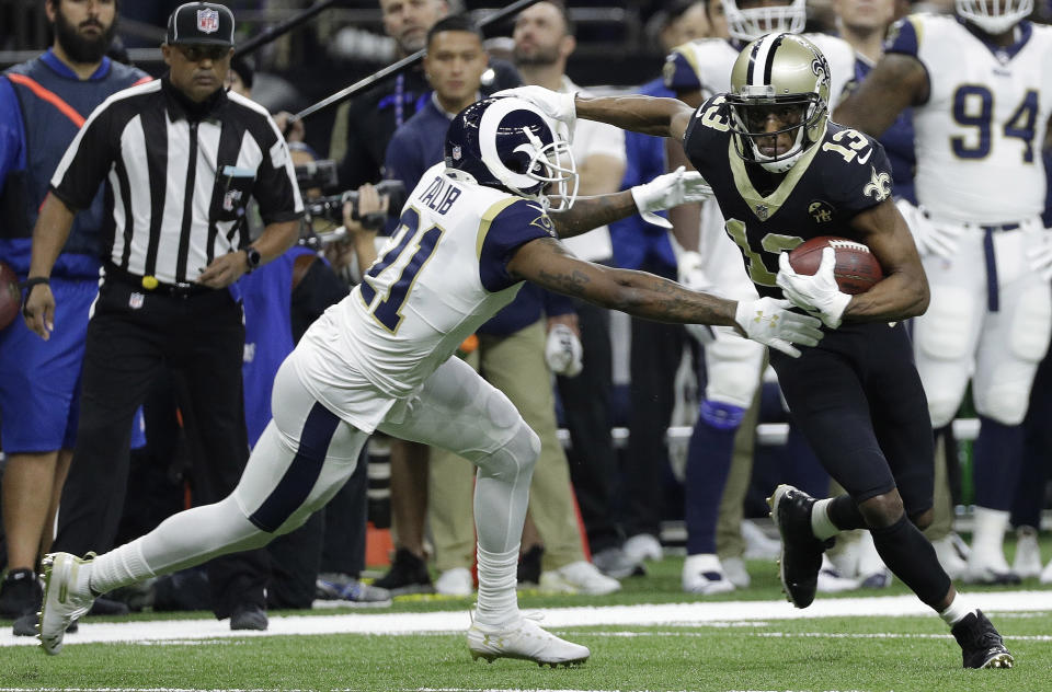 New Orleans Saints' Michael Thomas tries to get away from Los Angeles Rams' Aqib Talib during the first half the NFL football NFC championship game Sunday, Jan. 20, 2019, in New Orleans. (AP Photo/David J. Phillip)