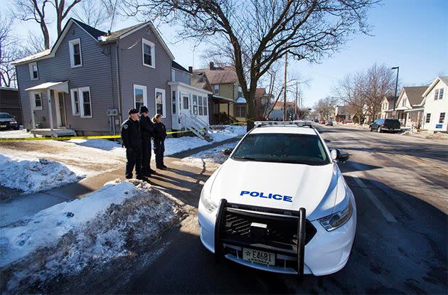 Madison Police stand outside the scene of a police involved shooting at a home in Madison. Photo: AP