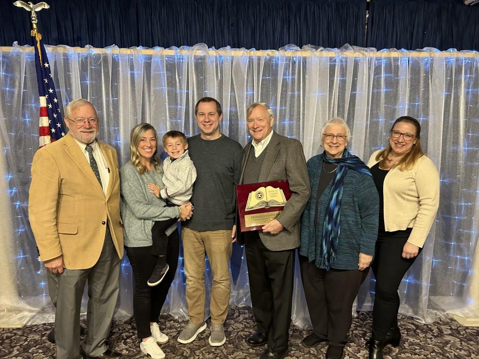 Retired 2B District Judge Donald Sanderson (third from right) poses for a picture with his family.