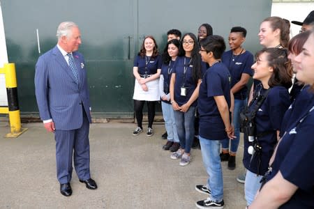 Britain's Prince Charles visits the set of James Bond at Pinewood Studios