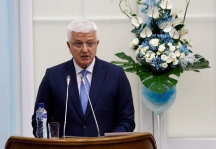 FILE PHOTO: Montenegro's Prime Minister Dusko Markovic addresses the parliament during a discussion on NATO membership agreement in Cetinje, Montenegro, April 28, 2017 REUTERS/Stevo Vasiljevic