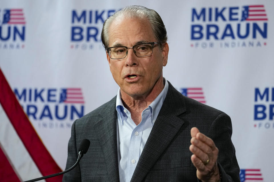 U.S. Sen. Mike Braun, R-Ind., announces in Indianapolis, Monday, Dec. 12, 2022 that he will for Indiana governor in 2024. Braun will face Indiana Lt. Gov. Suzanne Crouch for the Republican nomination. (AP Photo/Michael Conroy)