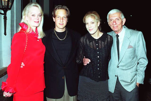 <p>David Keeler/Getty</p> Candy, Randy, Tori Spelling and Aaron Spelling in 1994
