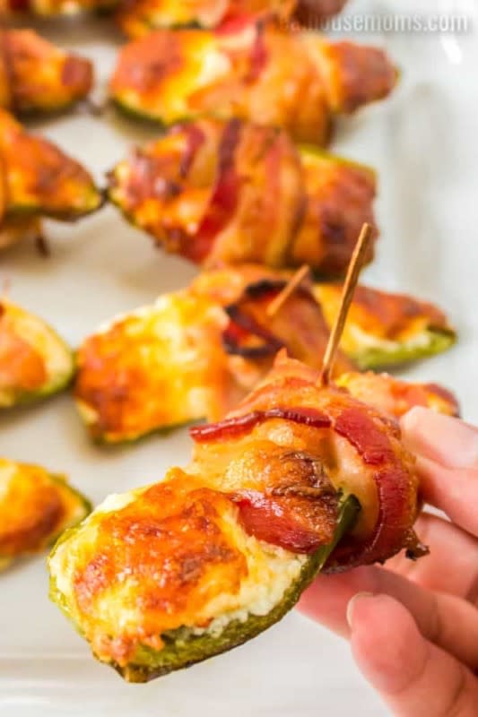 <p>Real Housemoms</p><p><strong>Recipe: <a href="https://realhousemoms.com/bacon-wrapped-chicken-jalapeno-poppers/" rel="nofollow noopener" target="_blank" data-ylk="slk:Bacon-Wrapped Chicken Jalapeño Poppers;elm:context_link;itc:0;sec:content-canvas" class="link ">Bacon-Wrapped Chicken Jalapeño Poppers</a></strong></p>