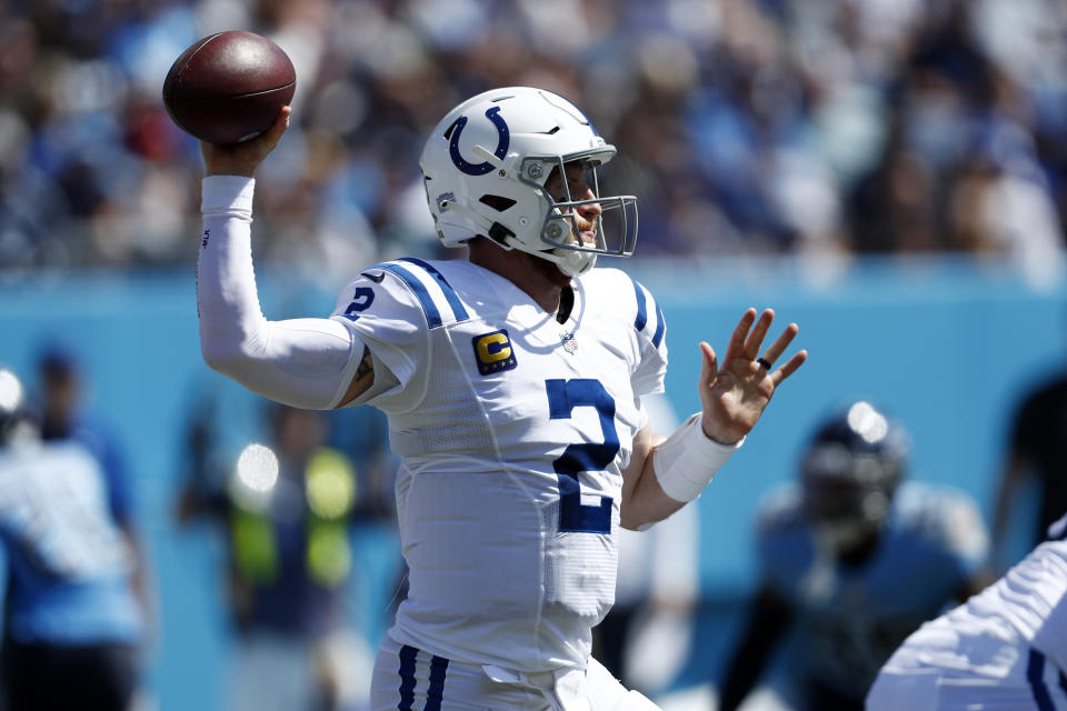 Indianapolis Colts quarterback Carson Wentz passes against the Tennessee Titans in the first half of an NFL football game Sunday, Sept. 26, 2021, in Nashville, Tenn. (AP Photo/Wade Payne)