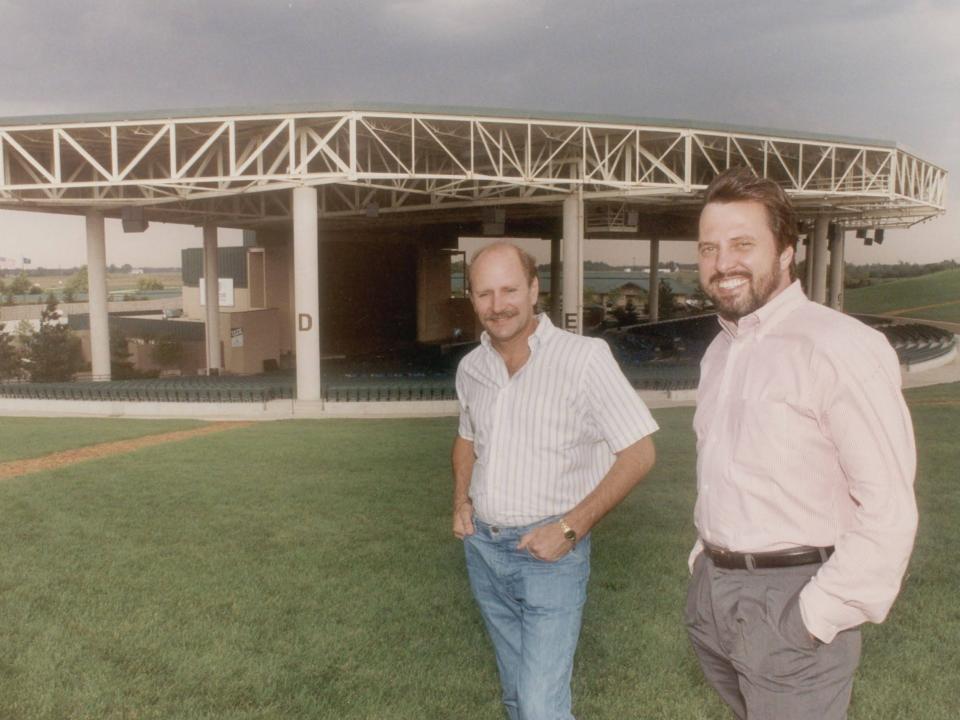 In this 1991 photo, Sunshine Promotions owners Steve Sybesma, left, and Dave Lucas pose at Deer Creek Music Center (now known as Ruoff Music Center).