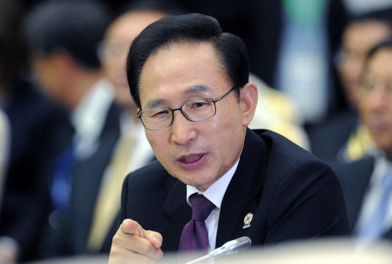 South Korean President Lee Myung-Bak in Phnom Penh on November 20, 2012. South Korea's outgoing president on Tuesday pardoned a host of former close aides and confidantes jailed for corruption, despite criticism from his successor