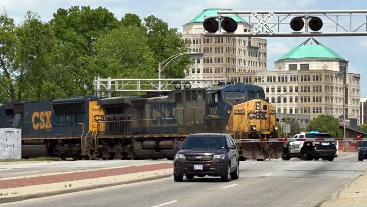 A crash between a train and motorcycle Wednesday afternoon closed Martin Luther King Jr. Boulevard in Hamilton, according to police.