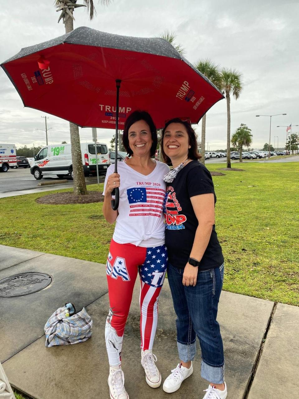 Tammy Frick and her best friend, Casey Larson, attend a rally hosted by Vice President Mike Pence at the Talllahassee International Airport on Saturday, Oct. 24, 2020.