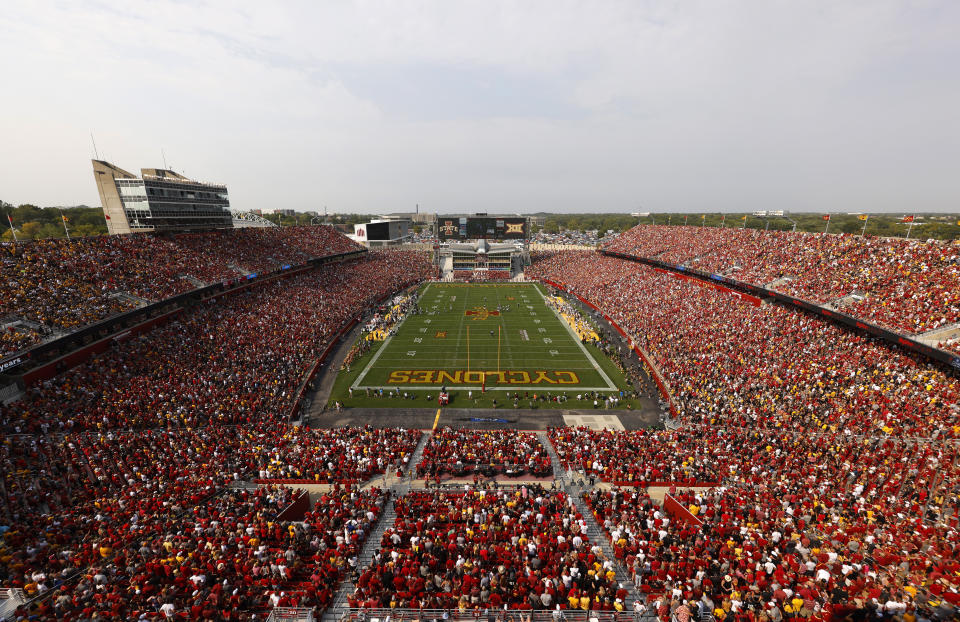 FILE - Iowa State takes on Iowa in a sellout crowd of 61,500 people at Jack Trice Stadium during the first half of an NCAA college football game, Saturday, Sept. 11, 2021, in Ames, Iowa. A digital platform where college athletes can anonymously alert their administrations to improper or illegal conduct by coaches, teammates or others is expanding to allow them to report gambling activity they’re aware of or witnessed to sports wagering integrity investigators. (AP Photo/Matthew Putney, File)