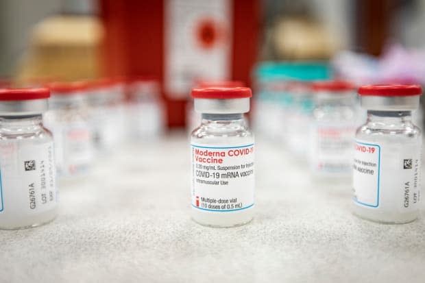 Bottles containing the Moderna COVID-19 vaccine are pictured at a clinic in Toronto on Apr. 13, 2021.