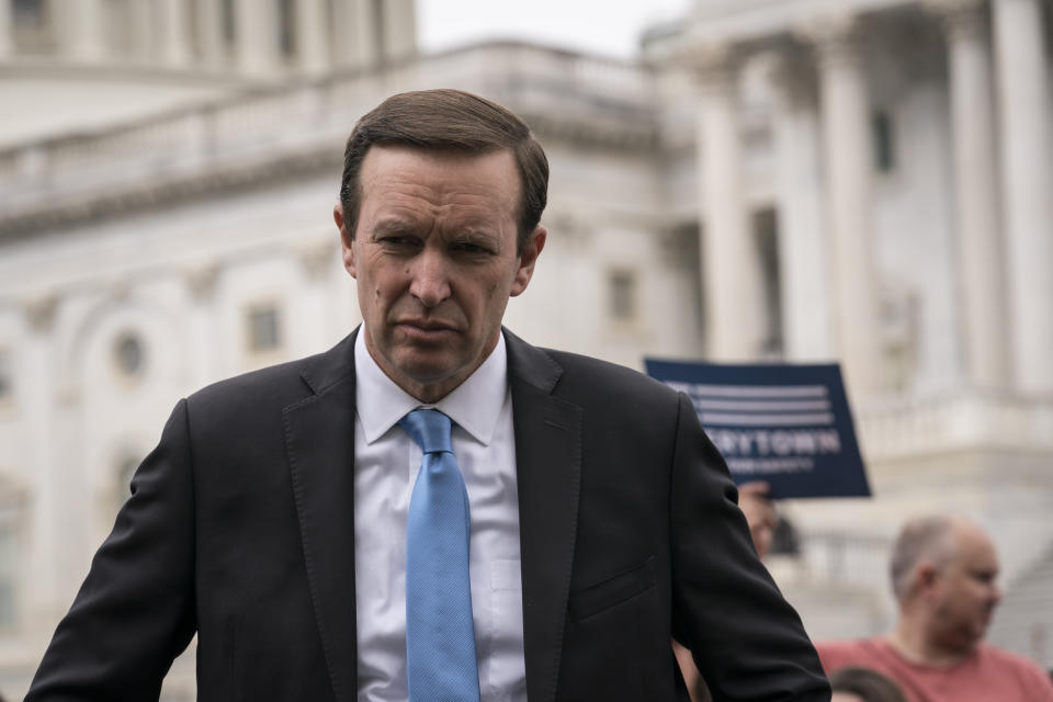 Sen. Chris Murphy, D-Conn., a gun control advocate, waits to speak to activists demanding action on gun control legislation after a gunman killed 19 children and two teachers in a Texas elementary school this week, at the Capitol in Washington, Thursday, May 26, 2022. A bipartisan group of senators is considering how Congress should respond to the horrific shooting of 19 children and two teachers in Uvalde, Texas. (AP Photo/J. Scott Applewhite)