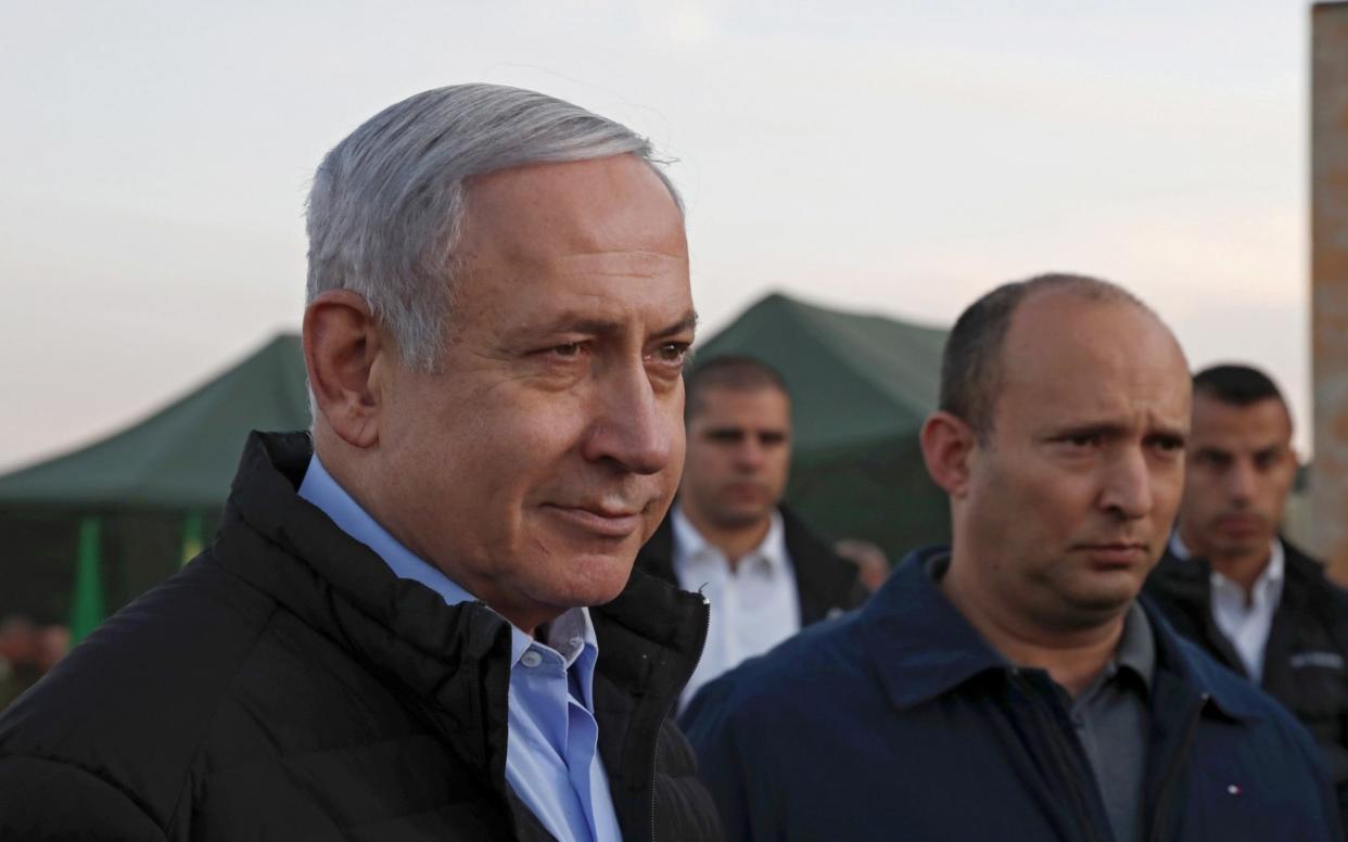 Benjamin Netanyahu (L) and former defense Minister Naftali Bennett, leader of the Yamina party - Atef Safadi/ REX