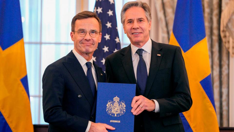 PHOTO: Secretary of State Antony Blinken stands with Swedish Prime Minister Ulf Kristersson holding Sweden's NATO Instruments of Accession at the State Department, Mar. 7, 2024, in Washington. (Jess Rapfogel/AP)