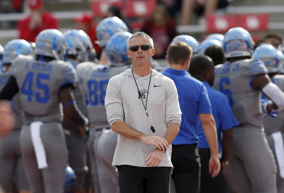 Coach Mike Norvell of the Memphis Tigers watches players warm up before their game against the Houston Cougars on Nov. 16. (Tim Warner/Getty Images)