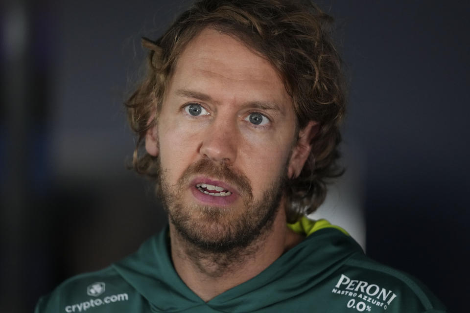 Aston Martin driver Sebastian Vettel of Germany answers to questions of journalists during interviews ahead of the Austrian Formula One Grand Prix at the Red Bull Ring racetrack in Spielberg, Thursday, July 7, 2022. The Austrian F1 Grand Prix is held on Sunday July 10, 2022. (AP Photo/Matthias Schrader)