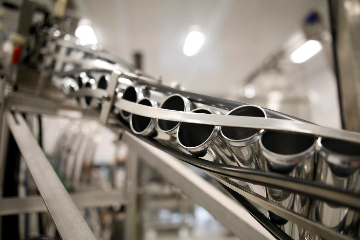 Beverage cans are run through machinery during a tour at a Canopy Growth facility that produces cannabis derivatives in Smiths Falls, Ontario, Canada October 29, 2019.  REUTERS/Blair Gable