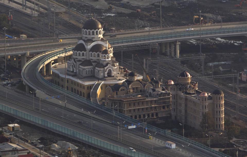 An aerial view from a helicopter shows an Orthodox cathedral under construction in Adler district of the Black Sea resort city of Sochi, December 23, 2013. Sochi will host the 2014 Winter Olympic Games in February. Picture taken December 23, 2013. REUTERS/Maxim Shemetov (RUSSIA - Tags: CITYSPACE SPORT OLYMPICS RELIGION BUSINESS CONSTRUCTION)