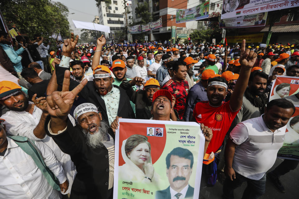 Supporters of Bangladesh Nationalist Party, headed by former Prime Minister Khaleda Zia, shout slogans during a rally in Dhaka, Bangladesh, Saturday, Dec. 10, 2022. Tens of thousands of opposition supporters rallied in Bangladesh's capital on Saturday to demand the government of Prime Minister Sheikh Hasina resign and install a caretaker before next general elections expected to be held in early 2024. (AP Photo/Mahmud Hossain Opu)