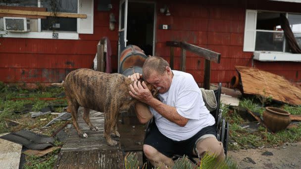 PHOTO: Steve Culver cries with his dog Otis as he talks about what he said was the, &#39;most terrifying event in his life,&#39; when Hurricane Harvey blew in and destroyed most of his home while he and his wife took shelter, Aug. 26, 2017, in Rockport, Texas.  (Joe Raedle/Getty Images)