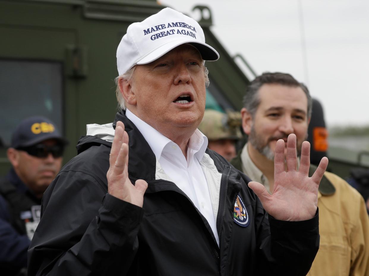 President Donald Trump speaks as he tours the U.S. border with Mexico at the Rio Grande on the southern border, Thursday, Jan. 10, 2019, in McAllen, Texas, as Sen. Ted Cruz, R-Texas, listens at right.