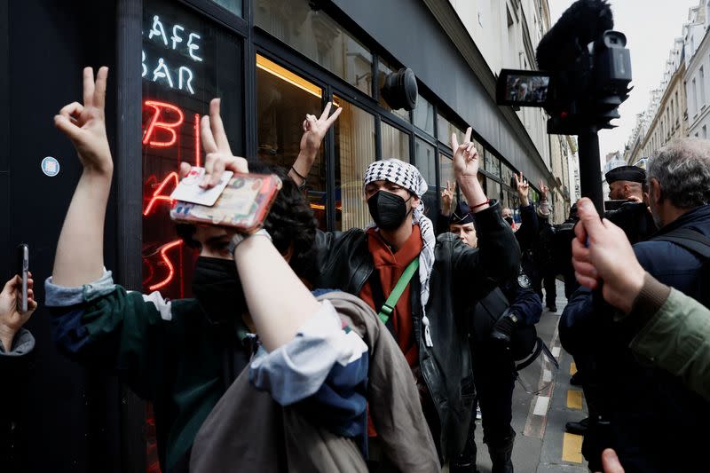 Protesters are escorted away by police forces during the evacuation of the Sciences Po University in Paris in support of Palestinians in Gaza