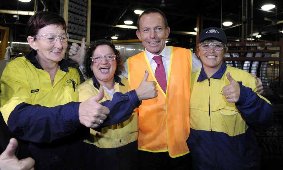 <span class="caption">Tony Abbott, second from right, led a relentless Opposition attack on Labor over the carbon price.</span> <span class="attribution"><span class="source">Ellen Smith/AAP</span></span>