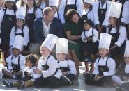 The Duke and Duchess of Cambridge pose for a photo with young chefs during the taste of British Columbia event at Mission Hill Winery in Kelowna, B.C., Tuesday, Sept 27, 2016. THE CANADIAN PRESS/Jonathan Hayward