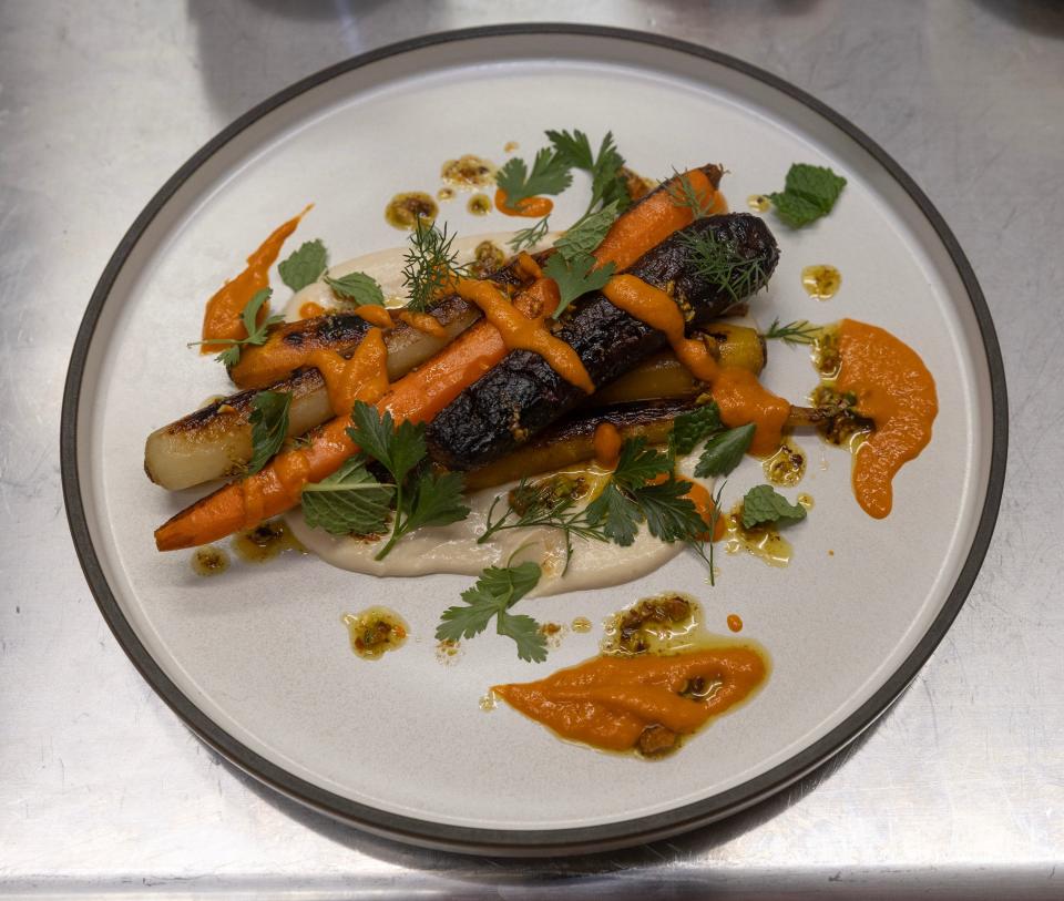 Charred carrots with hummus, harissa and pistachio at Clemmy's in Waretown.