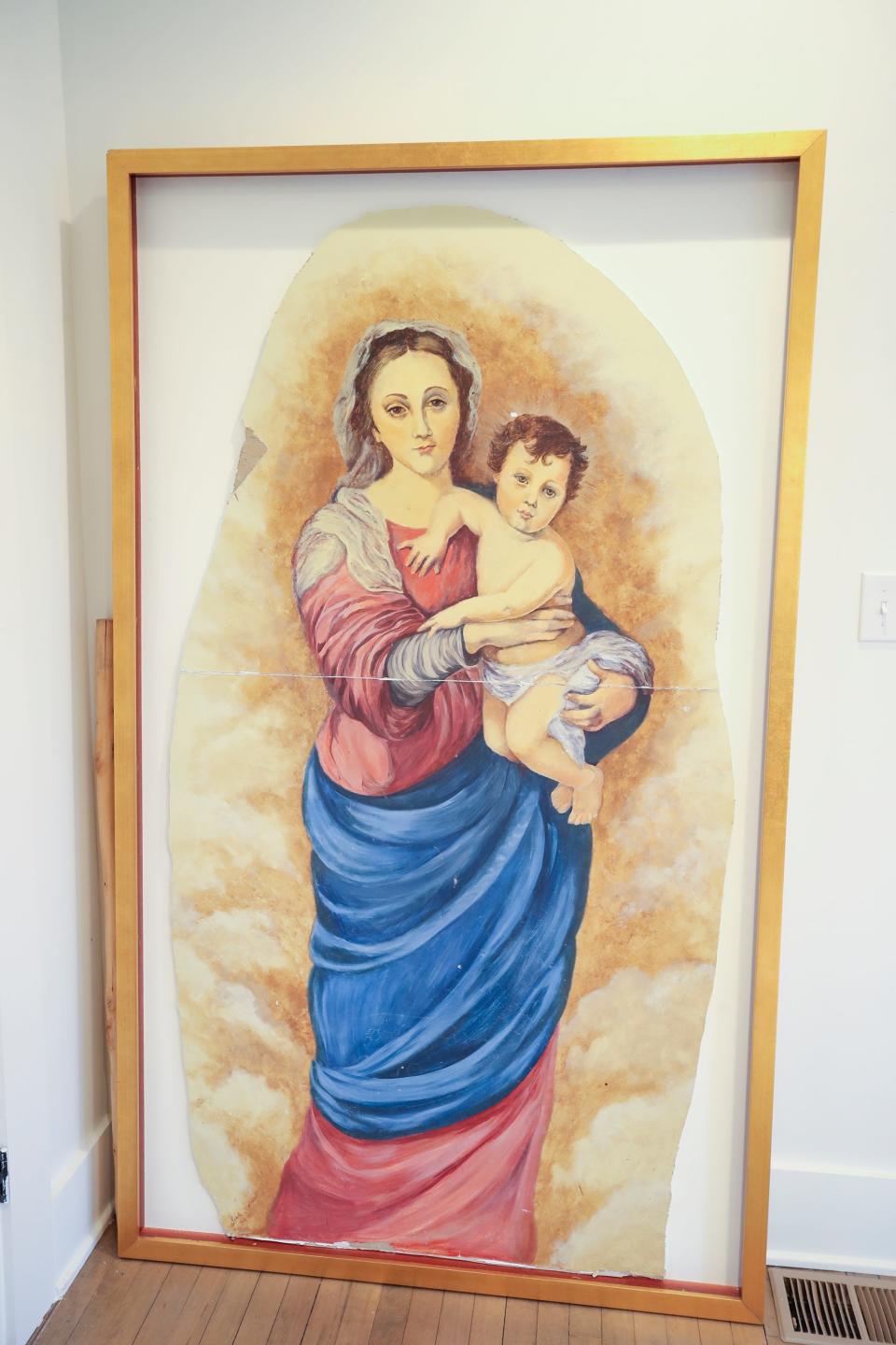 This Madonna and child painting came from another home the Paige family lived in and has traveled with them from place to place.