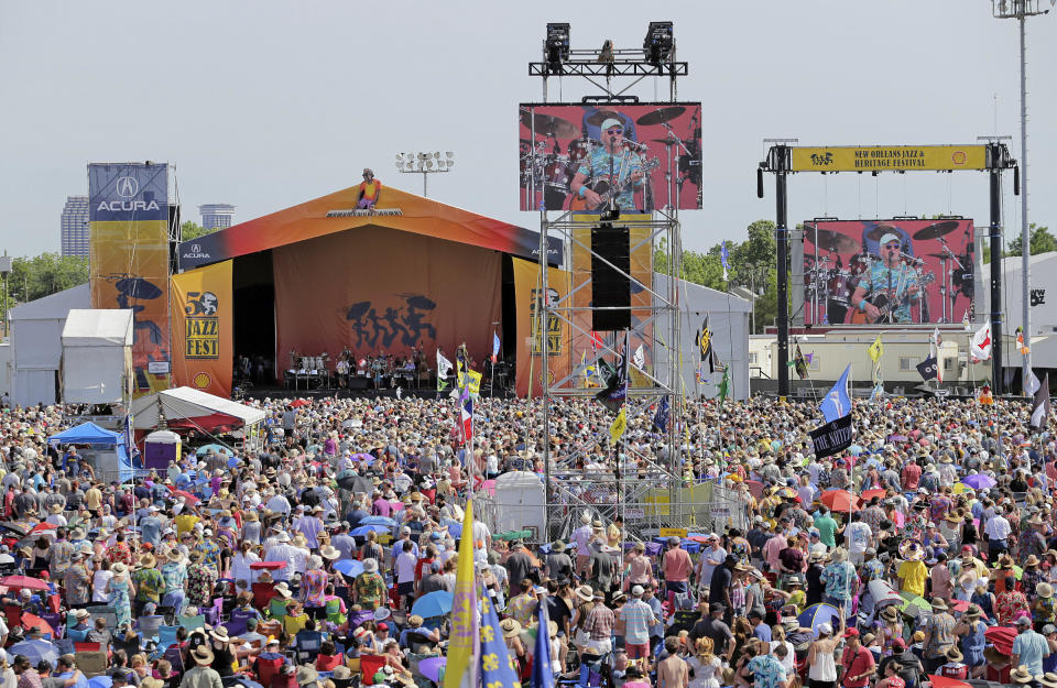 FILE - Jimmy Buffett performs on the Acura Stage during the New Orleans Jazz & Heritage Festival on Sunday, May 5, 2019. Buffett, who popularized beach bum soft rock with the escapist Caribbean-flavored song “Margaritaville” and turned that celebration of loafing into an empire of restaurants, resorts and frozen concoctions, has died, Friday, Sept. 1, 2023. (David Grunfeld /The Times-Picayune/The New Orleans Advocate via AP)