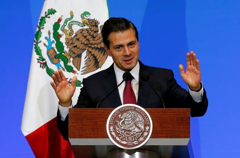 Mexico's President Enrique Pena Nieto gives a speech during the opening of the World Cancer Leaders' Summit in Mexico City, Mexico November 14, 2017. REUTERS/Henry Romero