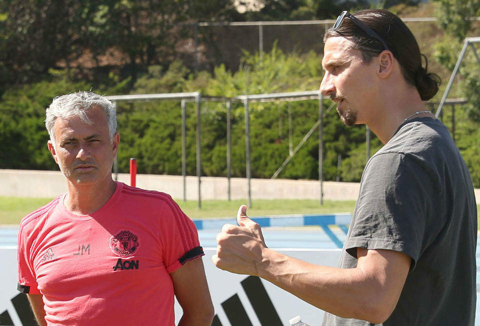 Zlatan Ibrahimovic chats to Jose Mourinho during a Manchester United pre-season training session at UCLA in Los Angeles