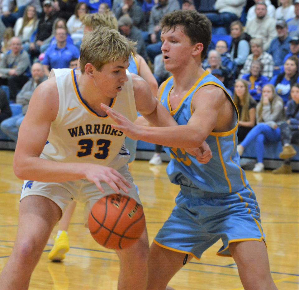 Castlewood's Bryon Laue makes a move to the basket against Hamlin's Zac VanMeeteren during their high school boys basketball game on Monday, Jan. 29, 2024 in Castlewood. No. 2 Class A Hamlin beat No. 3 Class B Castlewood 71-47.