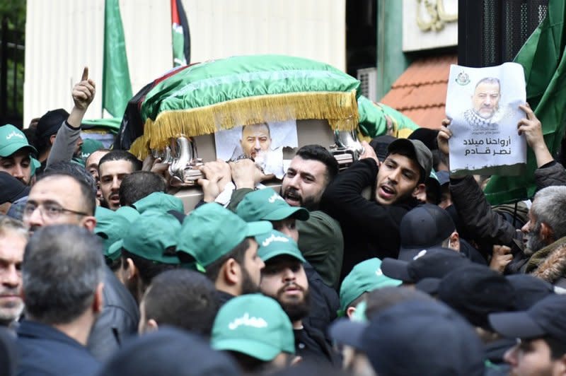 Mourners carry the coffin of Hamas leader Saleh al-Arouri, who was killed in an Israeli strike, during his funeral in Beirut, Lebanon, on Thursday. Photo by Abbas Salman/EPA-EFE