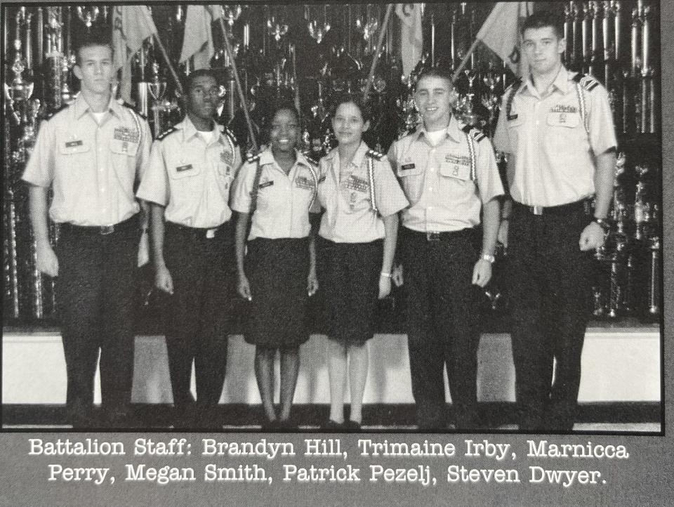 Chief Warrant Officer 3 Stephen R. Dwyer (far right) participated in Enterprise High School's JROTC program. Following his high school graduation, he we to West Point, New York to begin his military career.