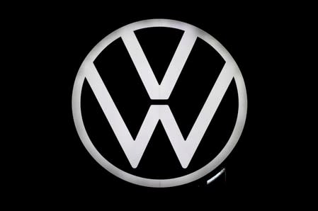 A new logo of German carmaker Volkswagen is unveiled at the VW headquarters in Wolfsburg