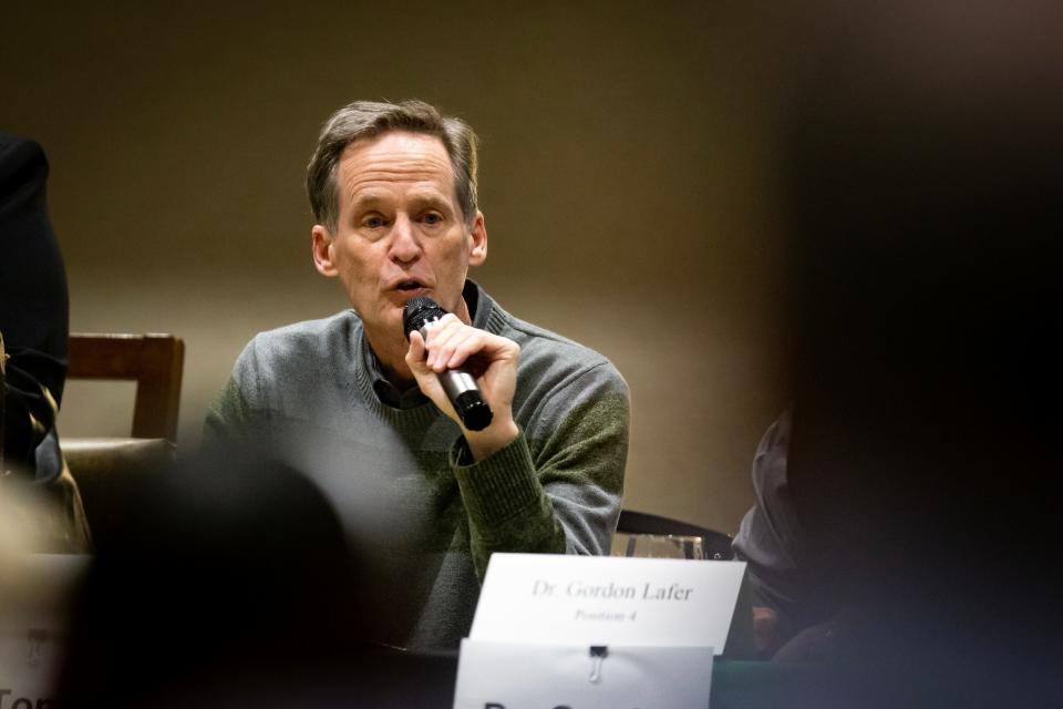 Tom Di Liberto, a candidate for the Eugene School District 4J school board, speaks April 4 during a forum hosted by the Rotary Club of Eugene.