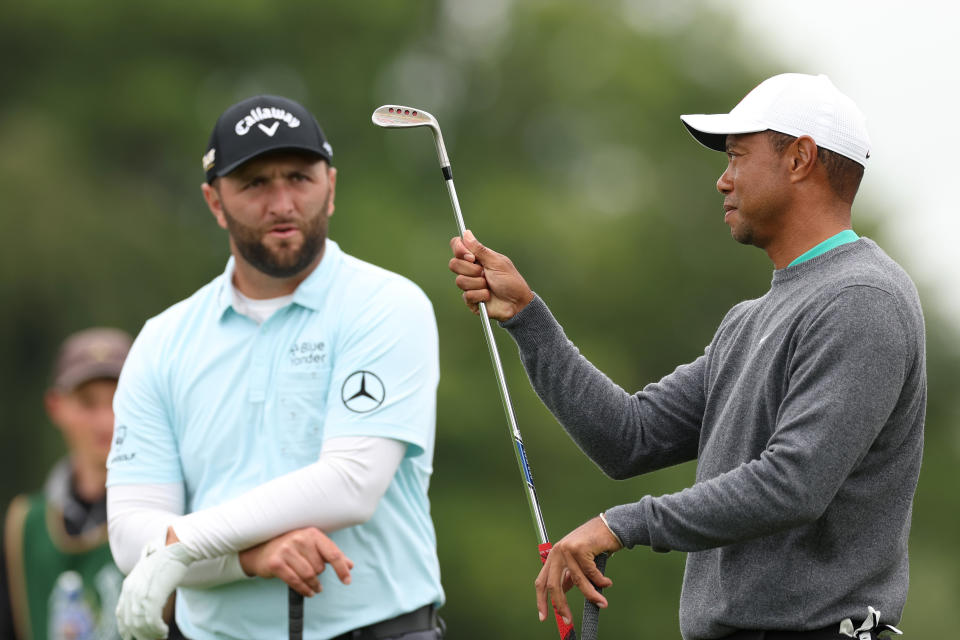 LIMERICK, IRELAND - JULY 05: Tiger Woods of United States and Jon Rahm of Spain chatting during Day Two of the JP McManus Pro-Am at Adare Manor on July 05, 2022 in Limerick, Ireland. (Photo by Oisin Keniry/Getty Images)