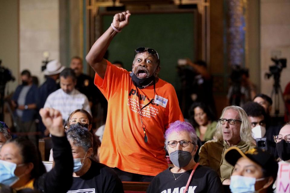 Protestors get emotional at the Los Angeles City Council meeting at city hall,