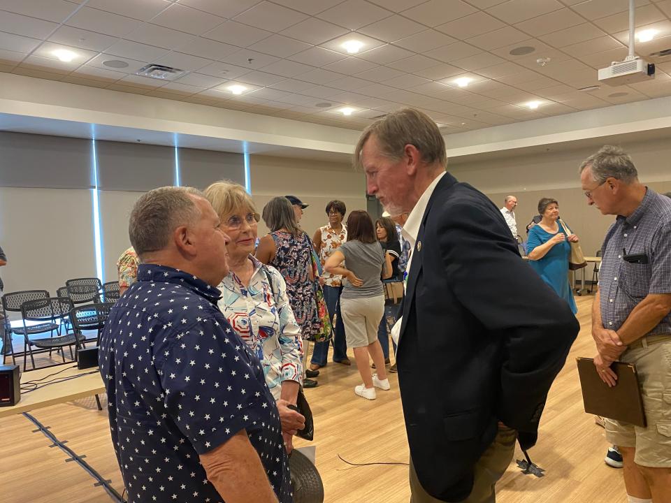 Rep. Paul Gosar, R-Ariz., talks with constituents after a congressional field hearing in Goodyear on July 21, 2023.