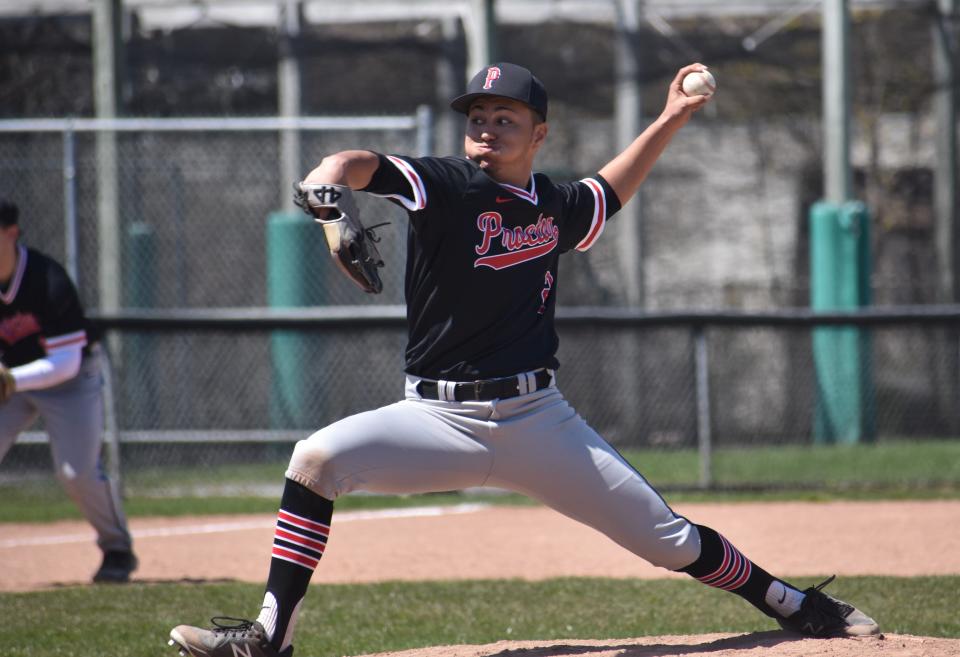 Proctor's Martin Learnard fires a pitch in the Raiders' 9-7 loss to Shaker Saturday, April 30, 2022