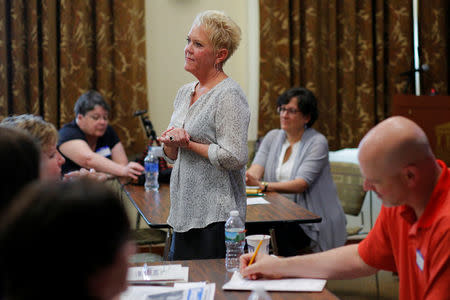 Debra Fowler, co-founder of History Unerased (HUE), which aims to provide educators with materials about the role lesbian, gay bisexual and transgender people have played in the history of the United States, leads a training session for educators in Lowell, Massachusetts, U.S., May 18, 2017. REUTERS/Brian Snyder