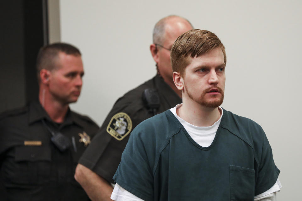 Jared Chance enters the courtroom for his sentencing in Kent County Circuit Court, Thursday, Oct. 10, 2019, in Grand Rapids, Mich. Chance, a Michigan man convicted of killing and dismembering Ashley Young has been sentenced to at least 100 years in prison after a judge called his actions "reprehensible and heinous."(Brian Hayes/The Grand Rapids Press via AP)