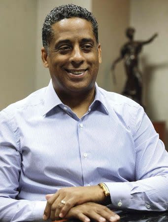 Cuban-born Miami businessman Hugo Cancio smiles during an interview in Coral Gables, Florida December 23, 2014. Cancio believes he's the new face of American-style entrepreneurship in Cuba. REUTERS/Javier Galeano