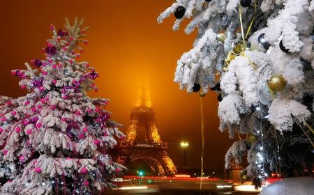 Christmas decorations are seen near the Eiffel Tower in the French capital of Paris, France, December 18, 2016. REUTERS/Jacky Naegelen