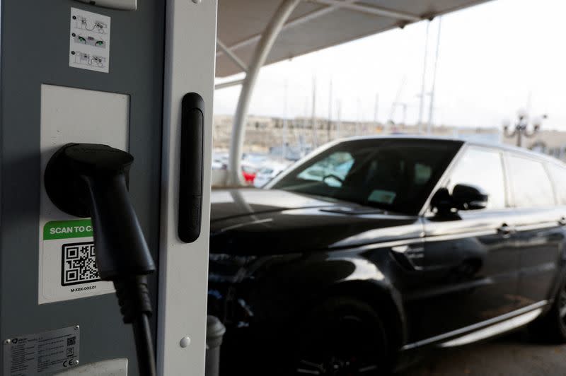 FILE PHOTO: A view of an electric vehicle plugged into a public charging station in Ta' Xbiex