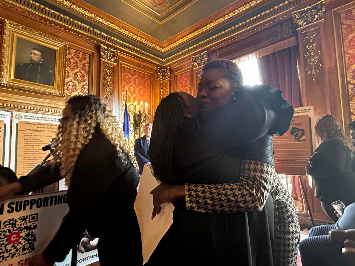 Rep. Shelia Stubbs hugs Erika Brown at an event Thursday to advocate for passage of a bill to create a Missing and Murdered Black women and girls task force. Brown attended the event on behalf of Sade Robinson's family. Robinson, of Milwaukee, was reported missing April 2. Maxwell Anderson, of Milwaukee, has been charged with her murder.